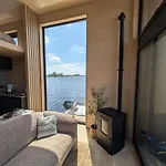 Modern Tiny Houseboat To Visit Amsterdam Botel